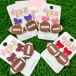 Bow Vibes + Friday Night Lights!!&nbsp; Our GameDay Tam Clay Co Bow Football Dangles feature all your favorite team colors!&nbsp; &nbsp;And it's the perfect way to add a pop of color to your gameday attire.  Be the talk of the stands when you arrive wearing these stunning, one-of-a-kind pieces of Glam ear art!