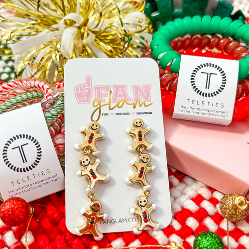 We never met a gingerbread cookie we didn't like.  This holiday, dreams dough come true, we've baked the best GLAM, our newest holiday addition is our Gingerbread Cookie Rhinestone Dangles.  Don't miss out on the best ear candy in town.