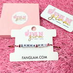Stack your sorority spirit with the perfect arm candy to rep your sorority in style. &nbsp;Select our classic sorority braided strand for a simple, everyday vibe — or go full-on bold with our 4-strand stack, featuring a mix of stretchy beaded bracelets in fun colors and gold shimmer accents. &nbsp;

Whether you’re dressing up for bid day, big/little reveal, or just flexing your chapter pride, this set has you covered.&nbsp; Wear one or wear them all!