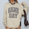 Celebrate your Sports Mom spirit in style with this fun and cozy Game Day Sweatshirt, available in two colors. Crafted from a soft cotton-polyester mix, it’s perfect for staying warm and comfortable while rooting for your team in the stands or hanging out at the tailgate party.