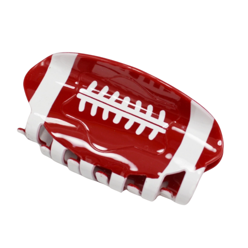 Show your team spirit with our playful Game Day Football Hair Clips! These versatile accessories add the perfect sporty touch to any outfit, making them essential for cheering on your favorite team. Mix and match these fun clips for a winning game day look that scores major style points!
