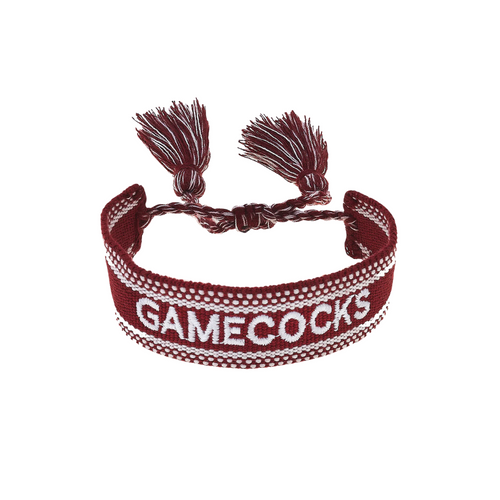 Add a splash of spirited fun to your game day look with the South Carolina Gamecocks Woven Tassel Bracelet. Lightweight and vibrant, this bracelet lets you show off your team pride with a playful twist that's sure to turn heads. Perfect for stacking or wearing solo, it’s the ultimate fan accessory to keep your style game strong while cheering on your Gamecocks!