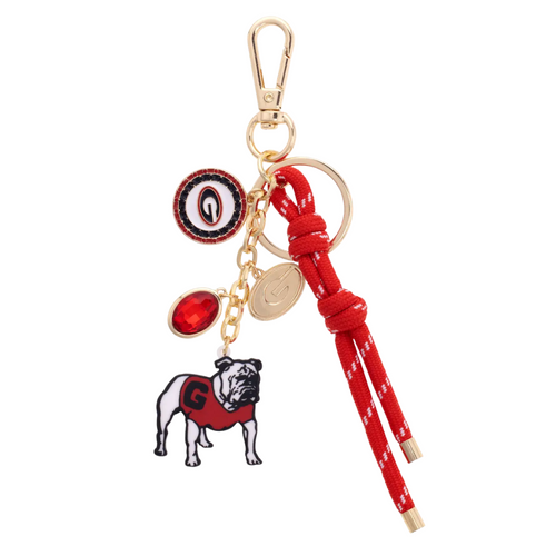 Show your team spirit with the Georgia Bulldogs Cluster Bag Charm! Featuring bold red accents, this playful charm adds a fun and spirited touch to your bag, perfect for tailgates, game days, or everyday wear. Let your fandom shine wherever you go!