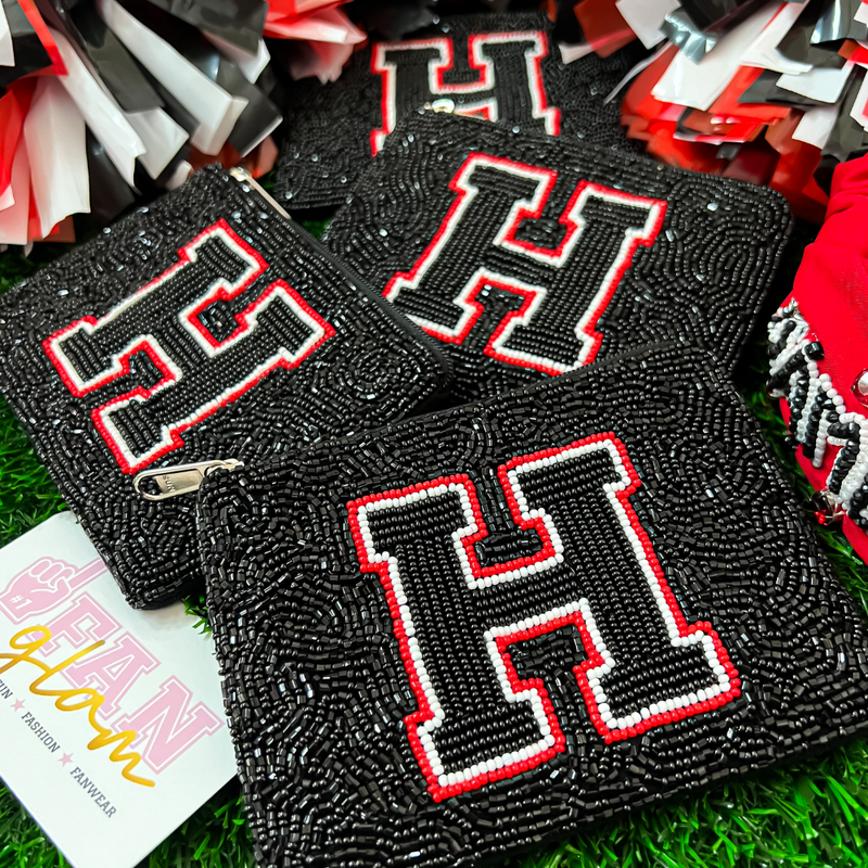 Support your Heath Hawks in style!   Elevate your clear bag status and show your school spirt when carrying one of our Rockwall-Heath H logo beaded coin bags!  A perfect sized team colored pouch to fit your cash, credit card lipstick and keys!