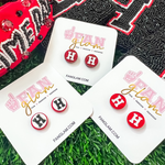 Be the talk of the stands when you arrive wearing your Rockwall-HeatH H Logo stud earrings.  Designed with Heath Hawks colors, they are the perfect earring for fans of all ages.  