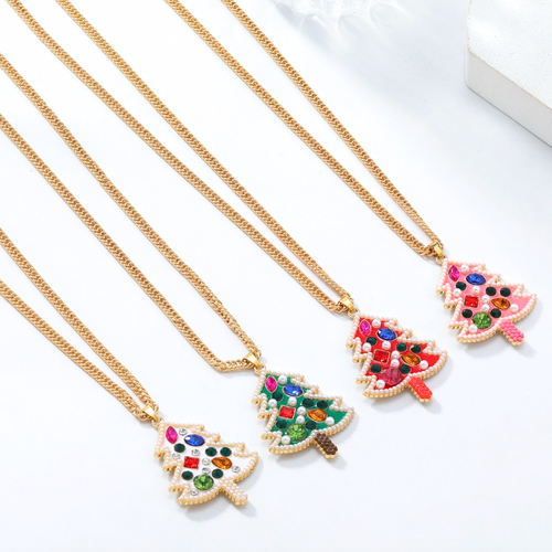 Best believe you'll be&nbsp;bejeweled when you walk into any room this holiday season.&nbsp; Our colorful Bejeweled Holiday Tree Pendant gold chain necklace is a show stopper.