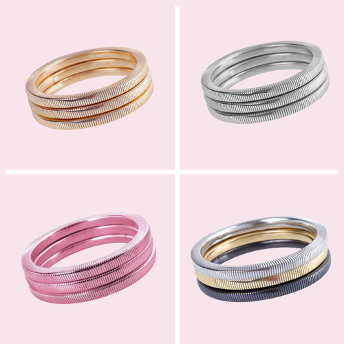 Our NEW Metallic Holiday Coil bracelet bangle stacks will have you GLAM + Ready for all your festive activities this season.&nbsp; Mix and match your favorite colors to make the perfect stack of three!
