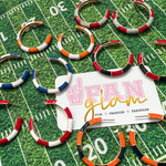 Make some noise as our Holla Back Hoops hit the field!  Bright, fun and dual-colored our Gameday hoops will give you a reason to cheer.  Available in 6 classic team colors.