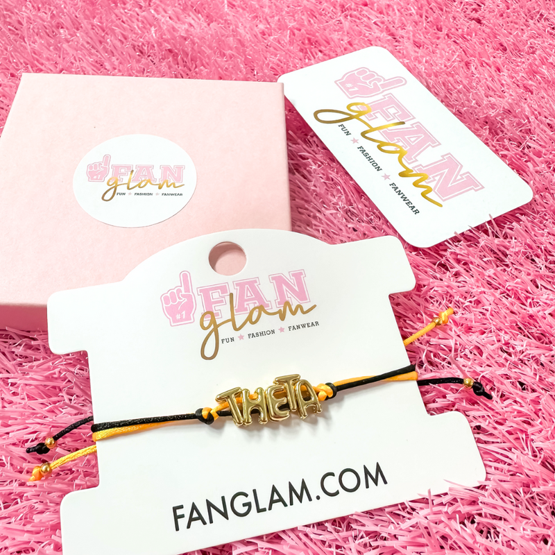 Our new cinch tie bracelets are the perfect pop of Greek glam — stackable, adjustable, and so on trend! Whether you are spoiling your Little, surprising your Big, or celebrating Bid Day, our gold letter greek bracelet adds just the right sparkle to every sorority moment.

With its comfy fit and meaningful charm, it's the go-to gift for your Greek fam — because sisterhood looks good on you!