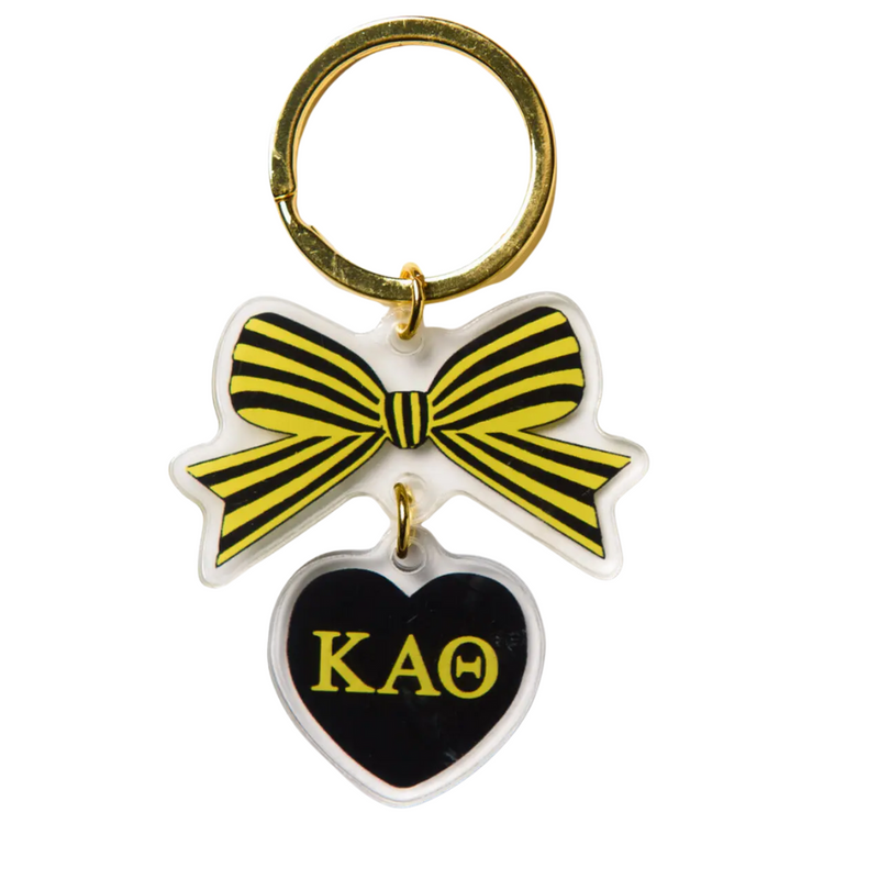 Add a splash of charm to your keys with the Bow-Dacious Key Chain! Featuring a delightful bow design accented with your sorority letters, this playful accessory is perfect for showing off your sisterhood pride in style. Compact and cute, it’s an ideal gift or a fun treat for yourself to keep your keys looking fabulous.