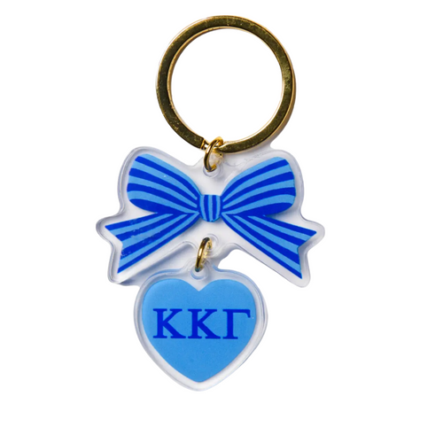 Add a splash of charm to your keys with the Bow-Dacious Key Chain! Featuring a delightful bow design accented with your sorority letters, this playful accessory is perfect for showing off your sisterhood pride in style. Compact and cute, it’s an ideal gift or a fun treat for yourself to keep your keys looking fabulous.