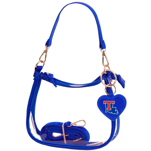 Our new Clara Clear Bag perfectly blends function and fashion, meeting stadium regulations with a chic design. It features a durable PVC body, secure zipper closure, and two interchangeable straps, keeping your essentials stylish and secure on game day.&nbsp;