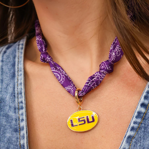 Show off your LSU pride with this fun and stylish Tigers Logo Bandana Scarf Necklace. Perfect for game day or everyday wear, it combines the charm of a bandana with the convenience of a necklace, making it easy to flaunt your team spirit wherever you go. Lightweight and comfortable, it adds a playful touch to any outfit while keeping your loyalty front and center.
