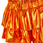 Our Metallic Skort is here to steal the spotlight in orange, purple, or red!&nbsp;With a flirty fit, fierce shine, and built-in shorts for all-day comfort, it's made for dancing, cheering, and being the most extra in the stands. Pair it with your fave tee and let the glam do the talking!