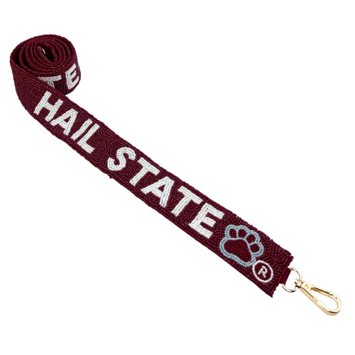 Go Dawgs!  Be the talk of the tailgate when you arrive wearing our Hail State beaded paw print bag strap.  The perfect Game Day accessory to elevate your clear bag and show your team spirit!