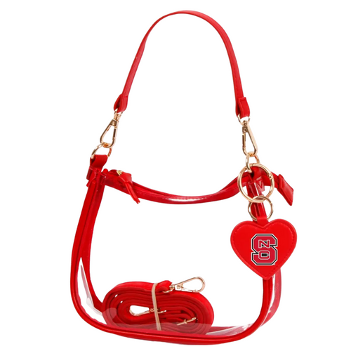 Our new Clara Clear Bag perfectly blends function and fashion, meeting stadium regulations with a chic design. It features a durable PVC body, secure zipper closure, and two interchangeable straps, keeping your essentials stylish and secure on game day.&nbsp;