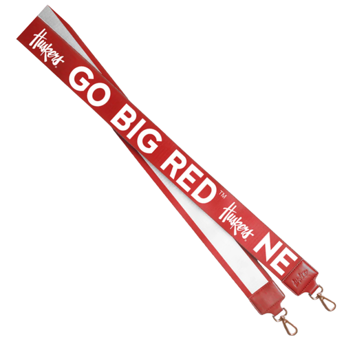 &nbsp;There's no better time to elevate your clear bag status by accessorizing your Game Day look with our dual sided strap in Husker colors! Choose your look with either the striped side or cheer on your team with NEBRASKA/GO BIG RED!