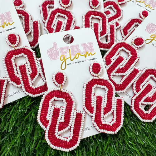 Boomer Sooner... &nbsp;It's Game Day&nbsp;in&nbsp;Norman, and there's no better time to elevate your head-to-toe tailgate style.&nbsp; &nbsp;A perfect accessory for any devoted fan, our exclusive beaded OU dangles offer a unique way to display your allegiance to the Sooners! They're lightweight and easy to wear all day on game days. THE perfect ear candy!
