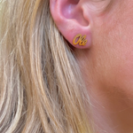 Show off your team spirit when you wear these Ole Miss gold stud earrings. &nbsp;The perfect Game Day accessory to complete your look and show your spirit!