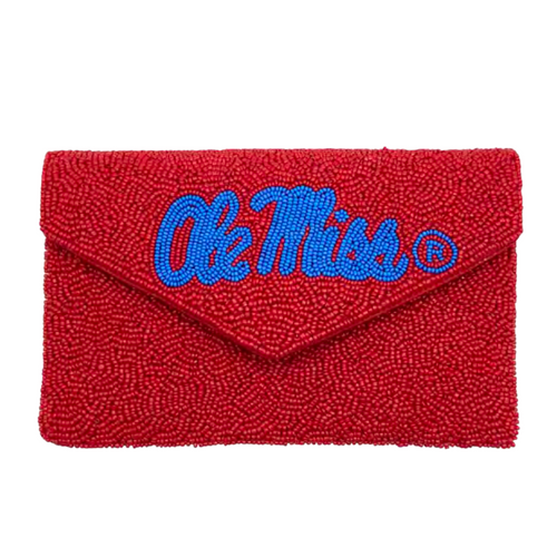See You Saturday In The Grove!  Rebels For Life!!  Accessorize Your Game Day Look With Our Uniquely Ole Miss Beaded Clutch.  Stadium sized approved!!  Our Mini clutch features a secure snap closure that keeps your cash, credit cards, lipstick, keys + more safe at the gam