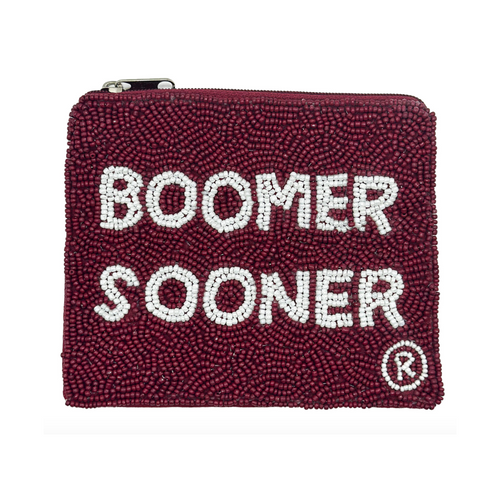 Elevate your clear bag status and show off your SOONERS spirit when accessorizing your Game Day look with our uniquely beaded Boomer Sooner zip coin bag.  Featuring a secure zip closure that keeps your cash, credit cards, lipstick, keys + more safe at the game!