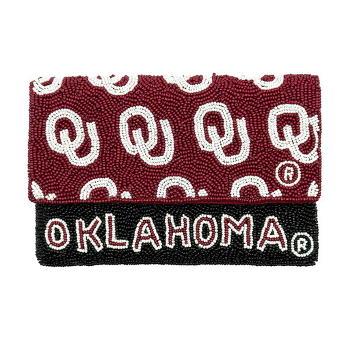 Show off your SOONERS spirit when accessorizing your Game Day look with our uniquely beaded OU Oklahoma logo mini clutch.    Stadium sized approved!!  Our Mini clutch features a secure snap closure that keeps your cash, credit cards, lipstick, keys + more safe at the game!