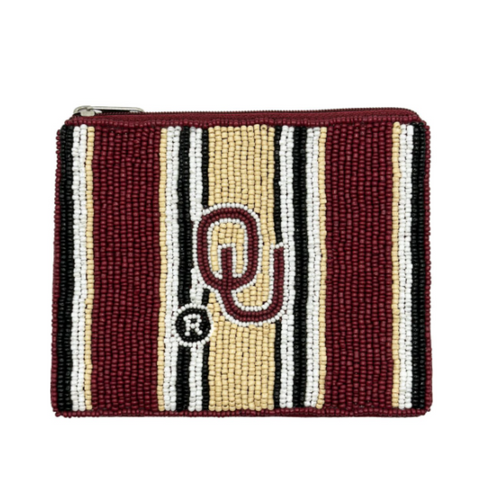 Elevate your clear bag status and show off your SOONERS spirit when accessorizing your Game Day look with our uniquely beaded OU stripe zip coin bag.