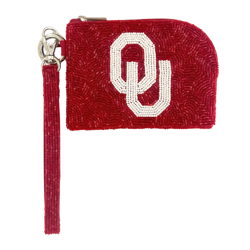Elevate your clear bag status and show off your SOONERS spirit in style! Our unique OU Beaded Bag Bracelet is the ultimate Game Day accessory.

Designed as our most versatile coin bag, it can be worn on your wrist as a statement piece or used to organize your essentials inside your favorite clear bag. Lightweight, eye-catching, and full of team pride, this is the perfect grab-and-go piece for every game day event!