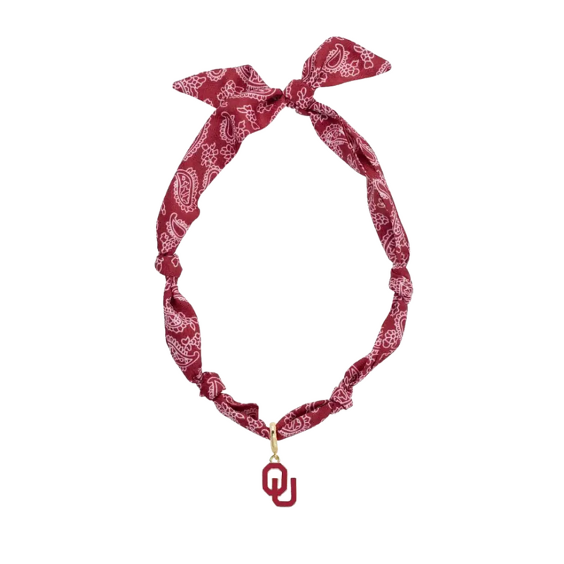 Show your Oklahoma Sooners pride with a playful twist! This bandana scarf necklace combines spirited team spirit with southern charm, making it the perfect accessory for game day or everyday fun. Lightweight and stylish, it adds a splash of color and personality to any outfit while keeping your fandom front and center.
