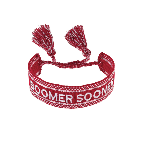 Show your Oklahoma Sooners pride with this playful Woven Tassel Bracelet. Lightweight and vibrant, it adds a fun pop of color to your game day look while keeping you comfortable. Perfect for stacking or wearing solo, it’s a spirited way to cheer on your team in style.