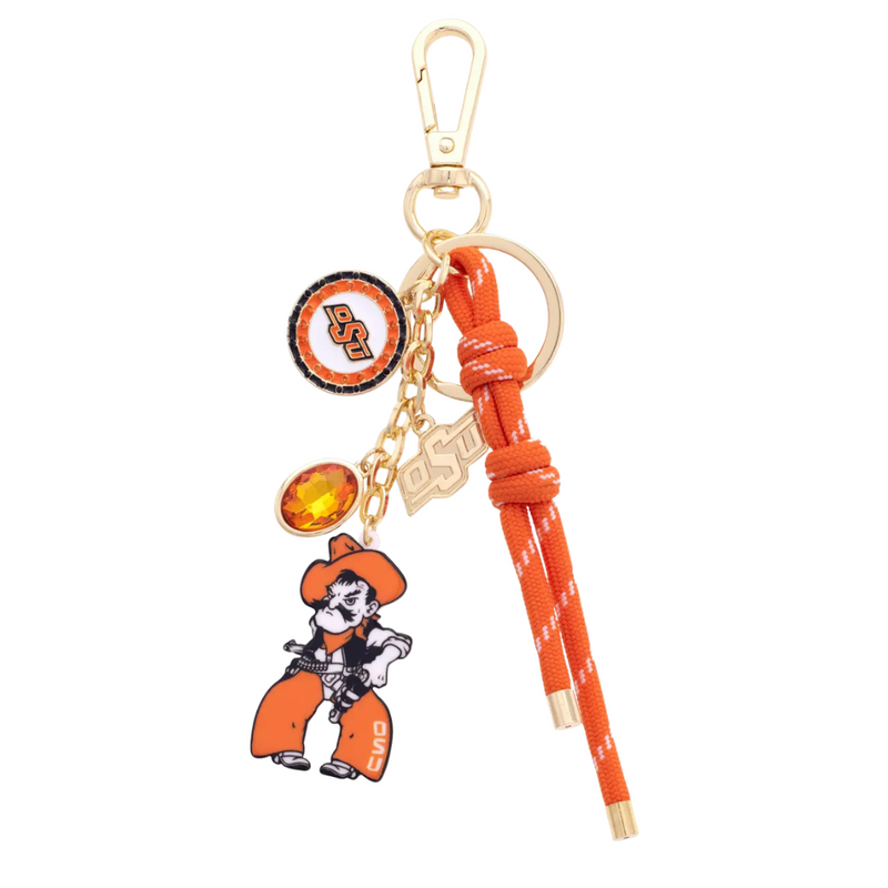 Show off your Cowboys spirit with this vibrant orange charm! The Oklahoma State Cowboys Cluster Bag Charm adds a playful pop of color and fun flair to any bag, making it the perfect accessory for fans who want to celebrate their team in style.