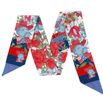 Wrap yourself in a playful piece of Oxford, Mississippi with our silky scarflette! Vibrant crimson, azure, and sage florals dance alongside whimsical illustrations of magnolia blossoms and stately columns. This luxurious accessory captures the charm and heritage of Oxford in every thread – perfect for locals and admirers of Southern elegance alike. A wearable celebration of this historic community's unique character!