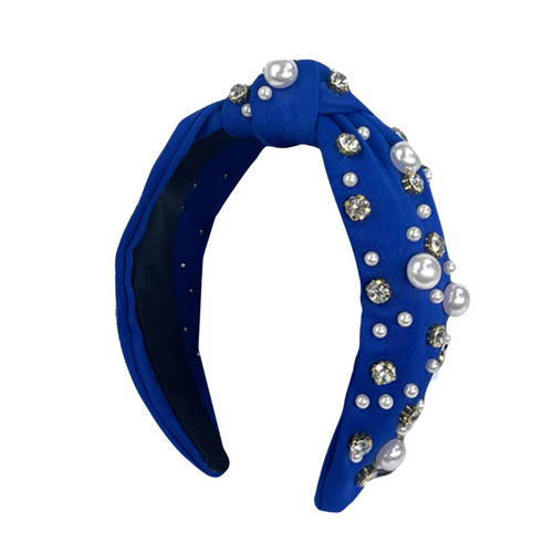 Our NEW pearl headband features a trendy knot design adorned with sparkling rhinestones and pearls.&nbsp;