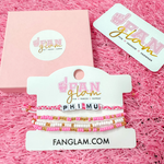 Stack your sorority spirit with the perfect arm candy to rep your sorority in style.  Select our classic sorority braided strand for a simple, everyday vibe — or go full-on bold with our 4-strand stack, featuring a mix of stretchy beaded bracelets in fun colors and gold shimmer accents.  

Whether you’re dressing up for bid day, big/little reveal, or just flexing your chapter pride, this set has you covered.  Wear one or wear them all!