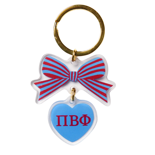Add a splash of charm to your keys with the Bow-Dacious Key Chain! Featuring a delightful bow design accented with your sorority letters, this playful accessory is perfect for showing off your sisterhood pride in style. Compact and cute, it’s an ideal gift or a fun treat for yourself to keep your keys looking fabulous.