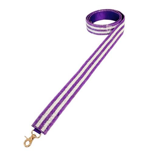 New Fan Glam Exclusive!! &nbsp;

Get ready to elevate your Game Day Glam&nbsp;and cheer your team on in style. Add a pop of spirit to your clear bag with our new Purple and White beaded bag strap — the perfect blend of fashion and fandom! &nbsp;

Featuring a secure classic gold clasp closure. Also available in 10 other glam team colors!