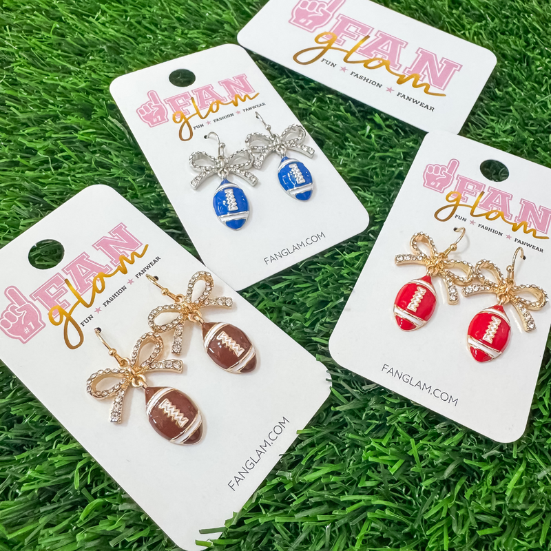 Cute as a BOW!&nbsp; Our new enamel football rhinestone bow dangles our a NEW GameDay favorite!&nbsp; Lightweight and fashion right for Friday Night Lights!