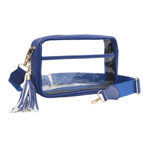 It's Here!!! Our Game Day stadium compliant crossbody zip bag! Featuring a clear PVC body with royal blue trim and gold metal accents. Comfortable and roomy, this bag is perfect for the Game Day girl who likes to come prepared!