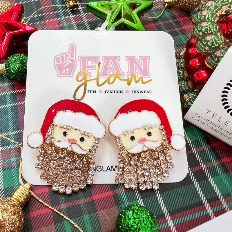 Ho Ho Ho!  Santa Is Coming To Town In GLAM Style!  Tis the season to sparkle in our oh so adorable Santa be-jeweled stud earrings.    A great secret Santa gift or the best GLAM for holiday parties.  Don't miss out on the best ear candy in town.