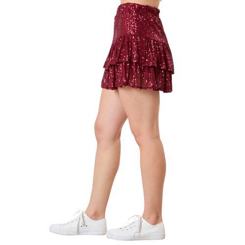 Game day just got a whole lot more stylish! This sequin mini-skirt is the ultimate way to show off your school spirit while staying comfortable. Designed for sports fans who love to stand out, it features an elastic waistband and built-in shorts for all-day wear—whether you're cheering in the stands or celebrating a big win. The tiered design and premium sequins add the perfect touch of flair, making it a must-have for any college game day outfit. Pull it on, shine bright, and rep your team in style!