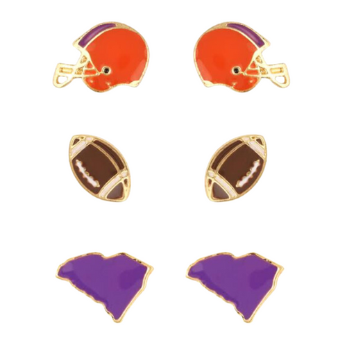 Show your CLEMSON pride with these adorable statement studs! Whether you’re tailgating at the stadium or watching the game from home, these earrings are a must-have for any Clemson fan!&nbsp;  Your team pride at your fingertips! Our new dual enamel stud earrings feature a helmet, football and your team state! Perfect size for ear stacking and great for all ages, the little ones will love wearing these as well!