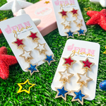We're obsessed with our new Shine Bright 3-Tier Star Dangles.  The perfect combination of sparkle and shine mixed with a dash of glam and pinch of star dust!  