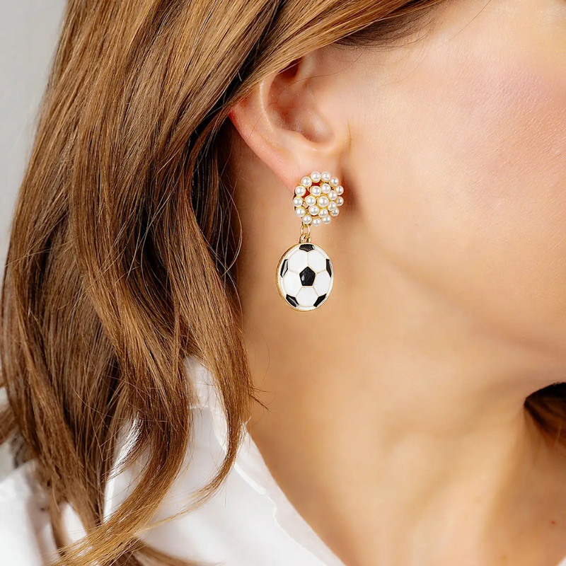 Get ready for Game Time in our new Soccer Pearl Cluster Enamel Dangles.&nbsp; Featuring gold accents and gold metal plating our new dangles showcase classic elegance for everyday wear.