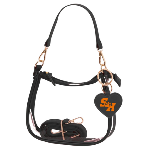 Our new Clara Clear Bag perfectly blends function and fashion, meeting stadium regulations with a chic design. It features a durable PVC body, secure zipper closure, and two interchangeable straps, keeping your essentials stylish and secure on game day.&nbsp;