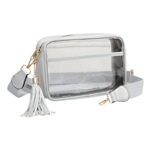 It's Here!!! Our Game Day stadium compliant crossbody zip bag! &nbsp;Featuring a clear PVC body with silver trim and gold metal accents. Comfortable and roomy, this bag is perfect for the Game Day girl who likes to come prepared!