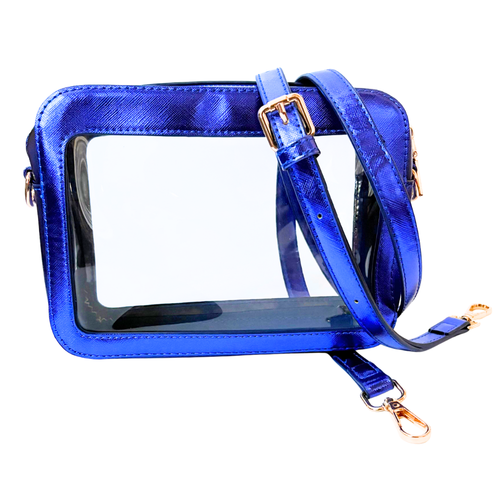Classic + Chic our Stella Clear crossbody top zip game day bag will be a New Fan Favorite!&nbsp; Featuring a clear PVC body, trimmed in metallic blue saffiano vegan leather with gold accents.&nbsp; Comfortable and roomy, this bag is perfect for the GameDay girl who likes to come prepared!
