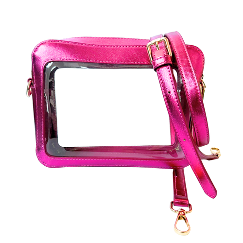 Classic + Chic our Stella Clear crossbody top zip game day bag will be a New Fan Favorite!&nbsp; Featuring a clear PVC body, trimmed in metallic pink saffiano vegan leather with gold accents.&nbsp; Comfortable and roomy, this bag is perfect for the GameDay girl who likes to come prepared!