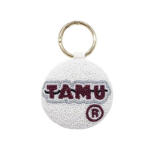 Gig'em Aggies! Game Day in Aggieland there's no better time to elevate your tailgate glam by accessorizing your Game Day bag with our uniquely beaded TAMU key ring charm This key ring is perfect for showing off your team spirit at sporting events, tailgates, or any other game day celebration. 