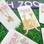 “Riff, Ram, Bah, Zoo... Give 'em Hell, TCU!”  It's time to cheer on the frogs and elevate your Game Day Fits by accessorizing your look with our new gold hammered horned frog statement dangles.