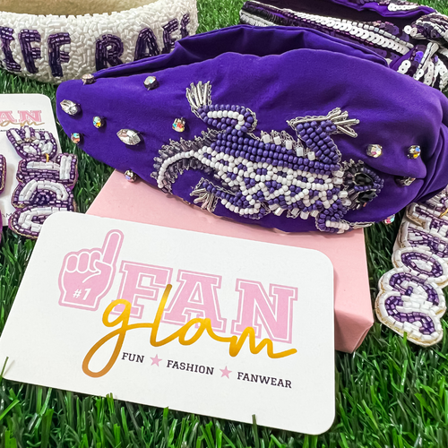 “Riff, Ram, Bah, Zoo... Give 'em Hell, TCU!”  It's time to cheer on the frogs and elevate your Game Day Fits by accessorizing your look with our uniquely beaded TCU Horned Frogs Beaded headband, featuring a trendy knotted design and adorned with sparkling rhinestones and dual colored beads.  The perfect headband for showing off your team spirit at sporting events, tailgates, or any other gameday celebration